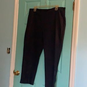 Navy dress pants with side zip closure.